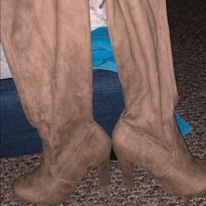 Pair of thigh high boot heels